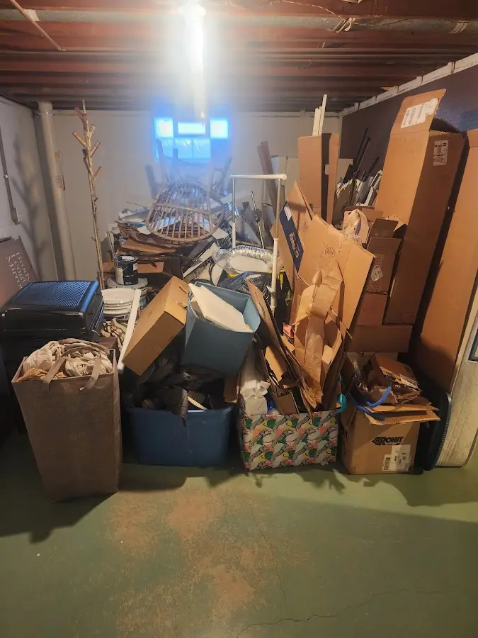 Roll-off dumpster container at job site for 6 Yard Dumpster Rental in Fairfax